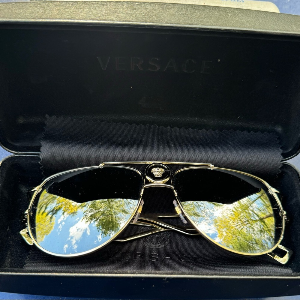Brand New… Never Worn VERSACE Sunglasses. Trying to raise money for a Charity.
